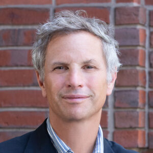 headshot of Adam Moss