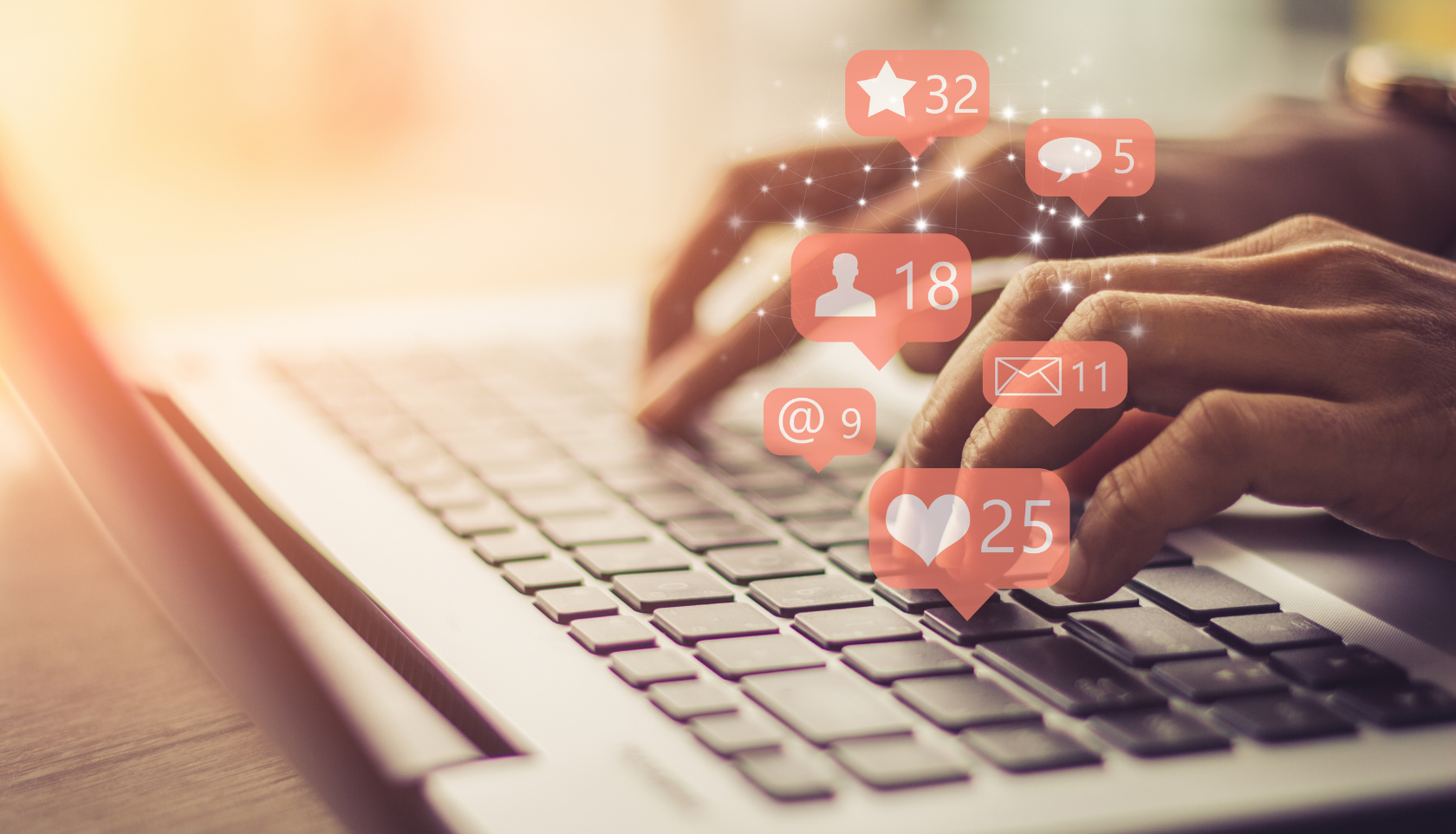 hands on a keyboard with social media icons overlayed in bubbles
