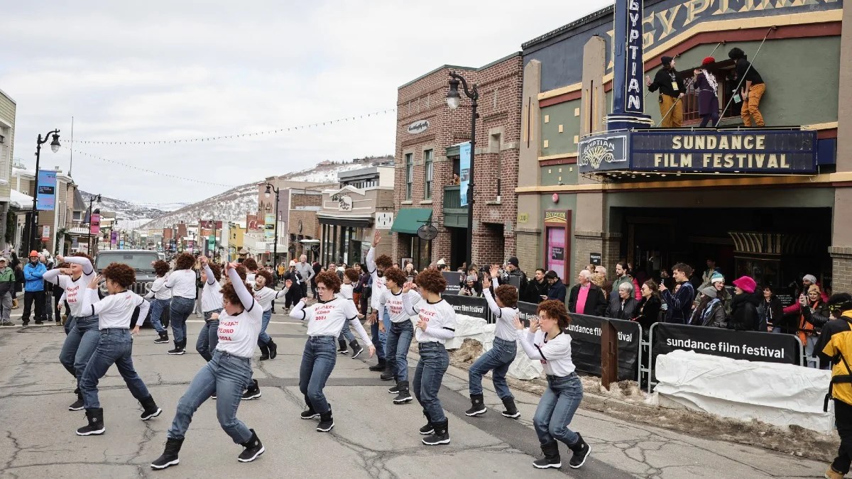 Photograph of people dancing in the street in front of the Egyptian Theatre at the Sundance Film Festival
