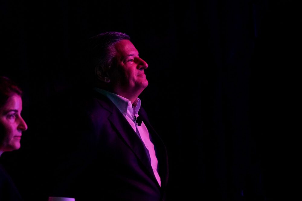 Photograph of a person looking upward