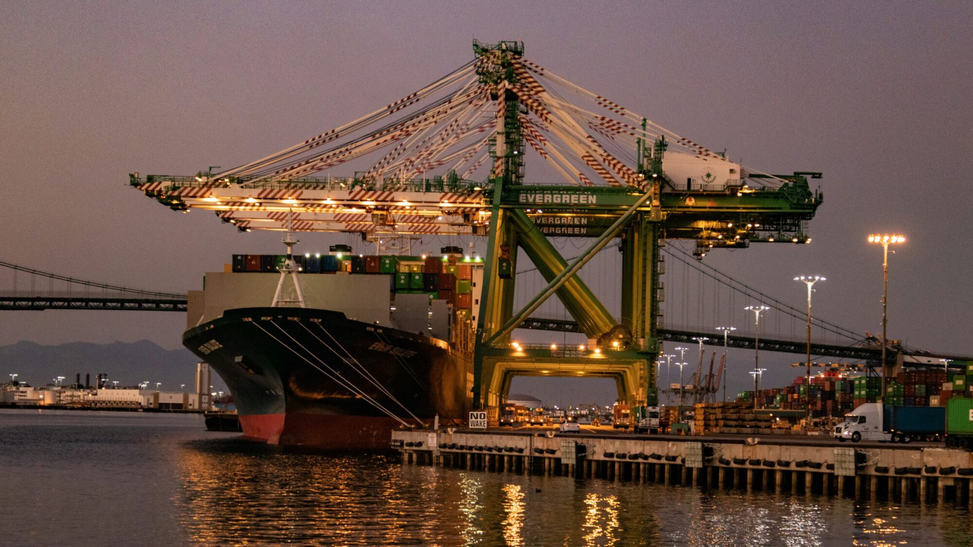 a large contatiner ship at a port