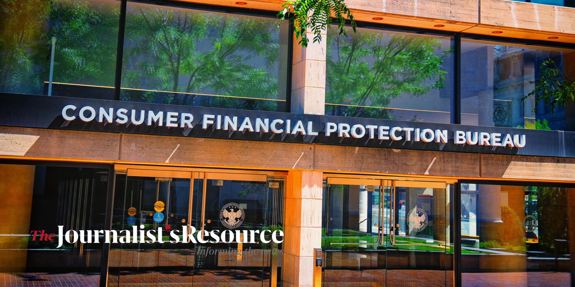 Alt text: Consumer Financial Protection Bureau building entrance with glass doors and tree reflections; “The Journalist’s Resource” logo.